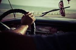 A person driving a car